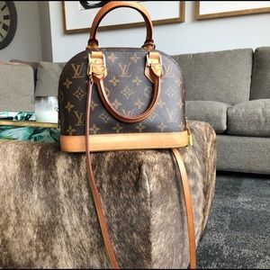 Louis Vuitton ALMA BB bag